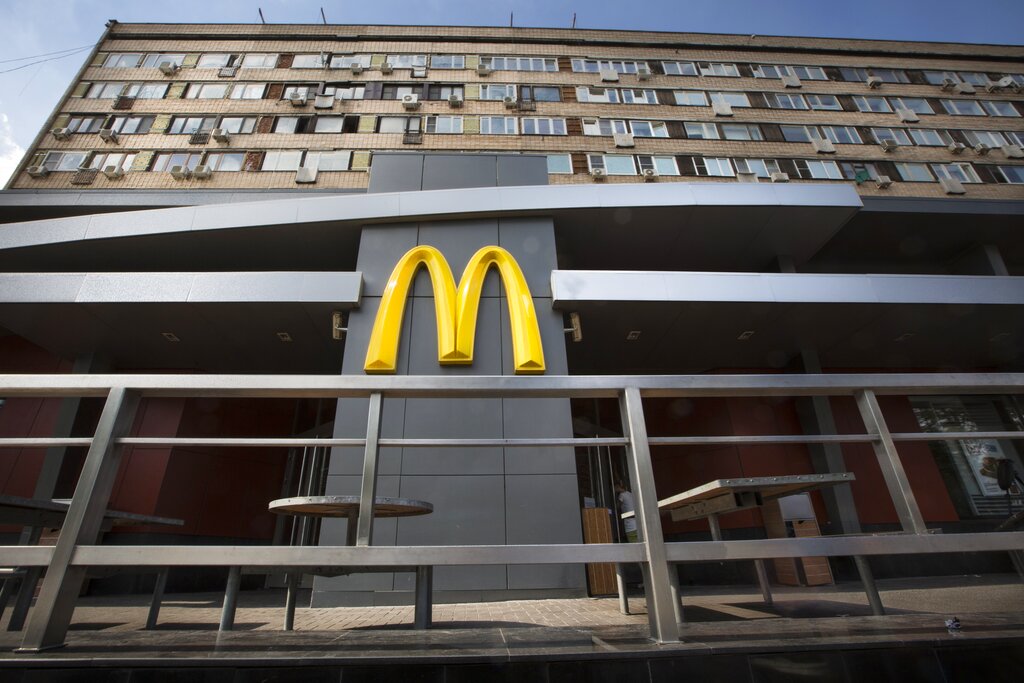 The sign of the oldest Moscow's McDonald's outlet in downtown Moscow, which was opened on Jan. 31, 1990, and is closed on Thursday, Aug. 21, 2014. Russian news agencies reported Thursday that the country's food safety agency will conduct checks on McDonald's restaurants in the Urals following food safety complaints, a day after four branches of the chain were shuttered in Moscow. (AP Photo/Alexander Zemlianichenko)