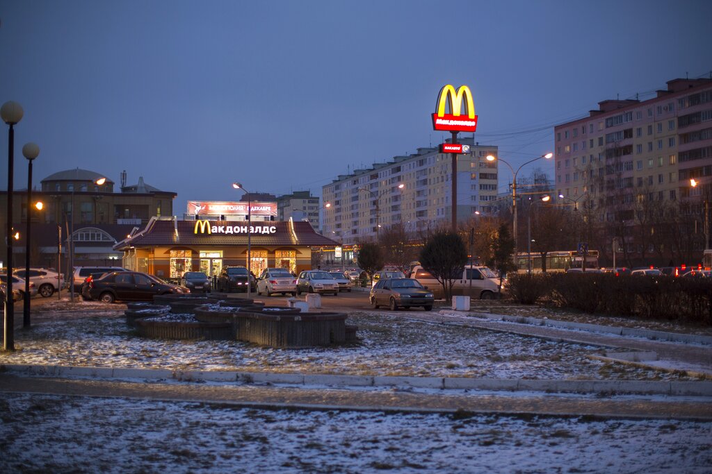 The McDonald's restaurant is seen in the center of Dmitrov, a Russian town 75 km., (47 miles) north from Moscow, Russia, Saturday, Dec. 6, 2014.  The very first McDonald's opened in the Soviet Union 24 years ago. (AP Photo/Alexander Zemlianichenko)