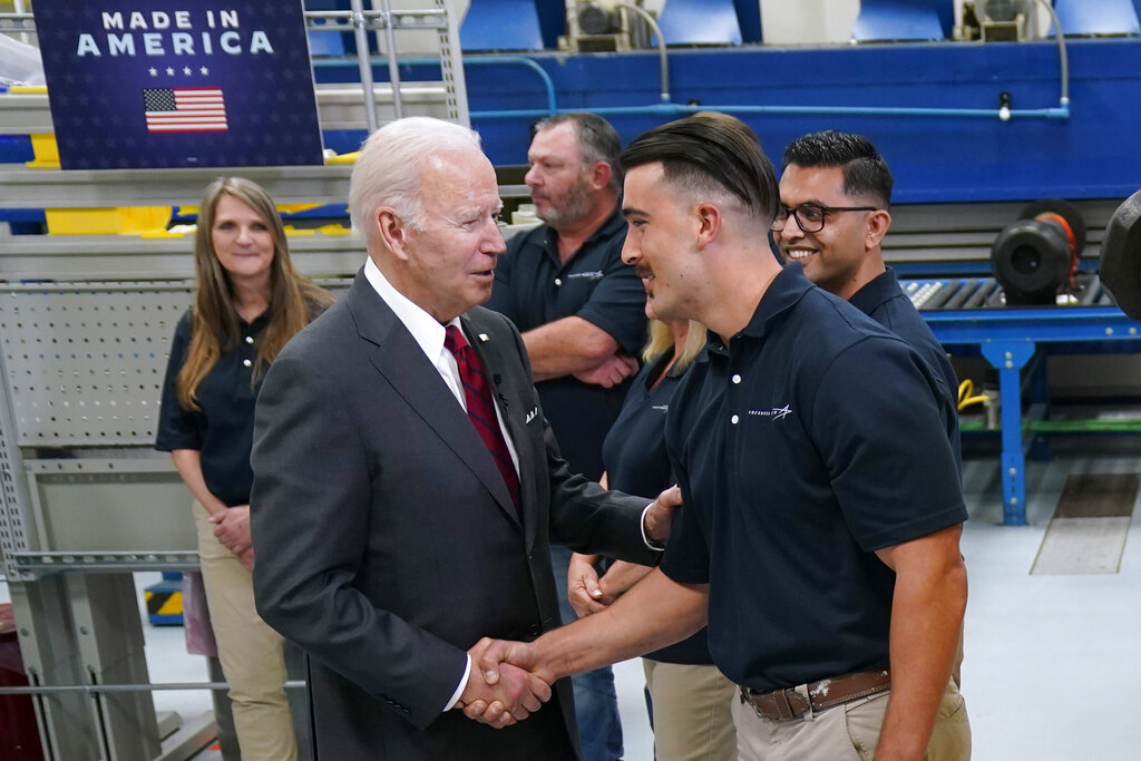 President Joe Biden greets workers during tour of the Lockheed Martin Pike County Operations facility where Javelin anti-tank missiles are manufactured, Tuesday, May 3, 2022, in Troy, Ala. (AP Photo/Evan Vucci)