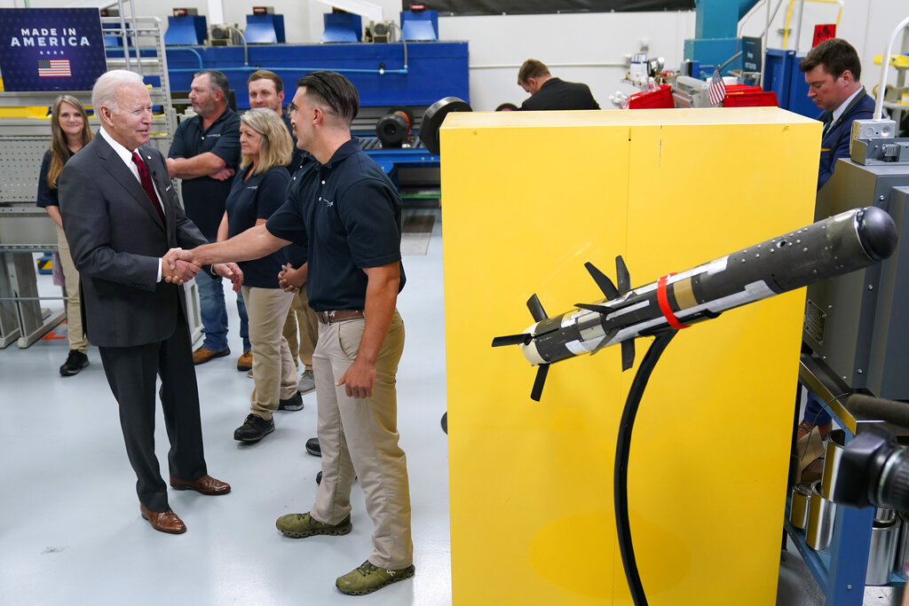 President Joe Biden greets workers during a tour of the Lockheed Martin Pike County Operations facility where Javelin anti-tank missiles are manufactured, Tuesday, May 3, 2022, in Troy, Ala. (AP Photo/Evan Vucci)