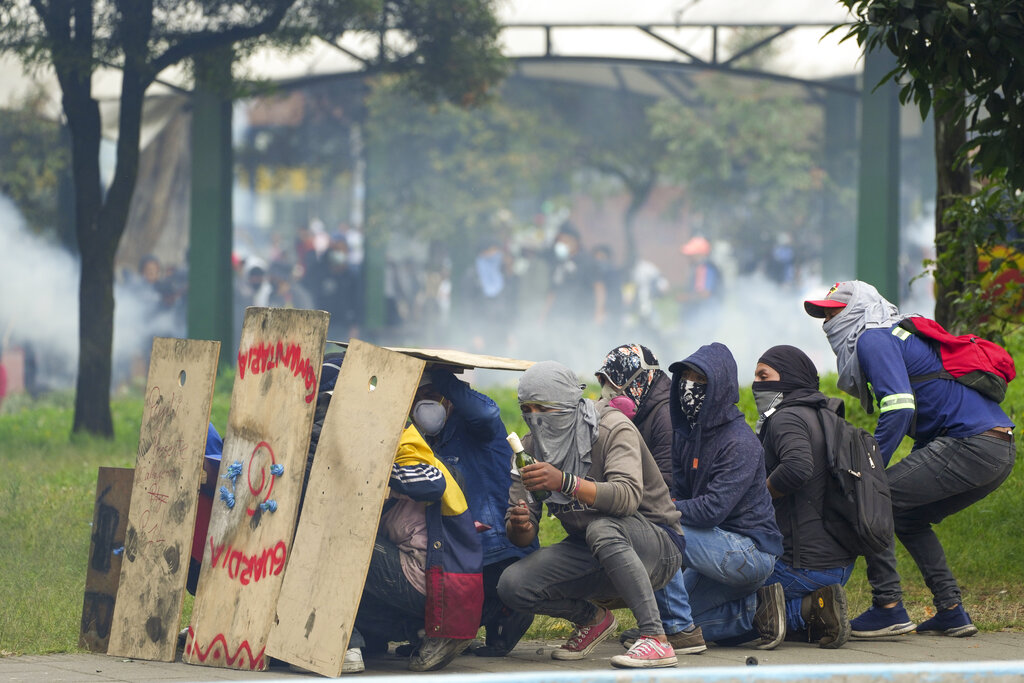 Demonstrators clash with police during a protest against the government of President Guillermo Lasso in Quito, Ecuador, Tuesday, June 21, 2022. (AP Photo/Dolores Ochoa)