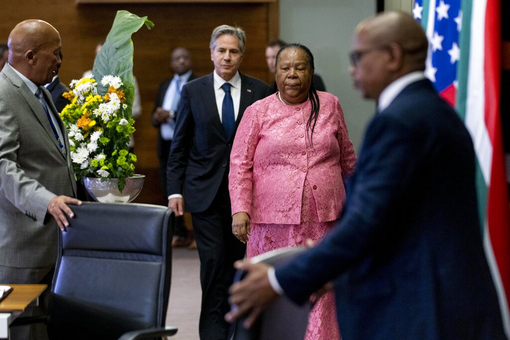 Secretary of State Antony Blinken and South Africa's Foreign Minister Naledi Pandor arrive for a news conference after meeting together at the South African Department of International Relations and Cooperation in Pretoria, South Africa, Monday, Aug. 8, 2022. Blinken is on a ten day trip to Cambodia, Philippines, South Africa, Congo, and Rwanda. (AP Photo/Andrew Harnik, Pool)