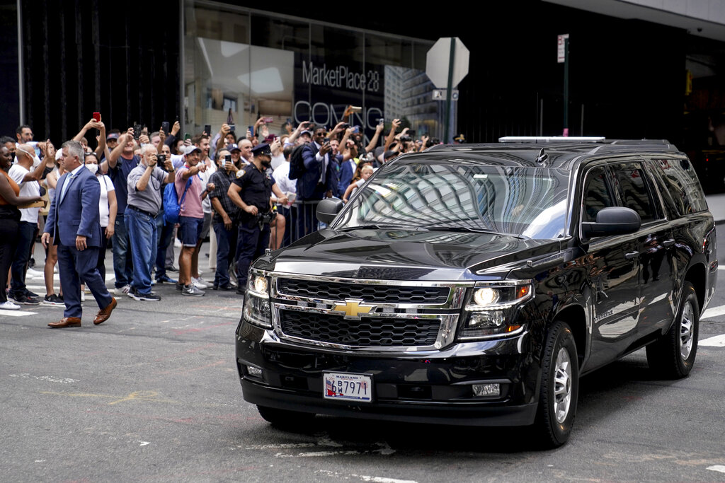 A vehicle carrying former President Donald Trump departs 28 Liberty after depositions in a civil investigation, Wednesday, Aug. 10, 2022, in New York. Trump says he invoked the Fifth Amendment and wouldn't answer questions under oath in the long-running New York civil investigation into his business dealings. (AP Photo/John Minchillo)