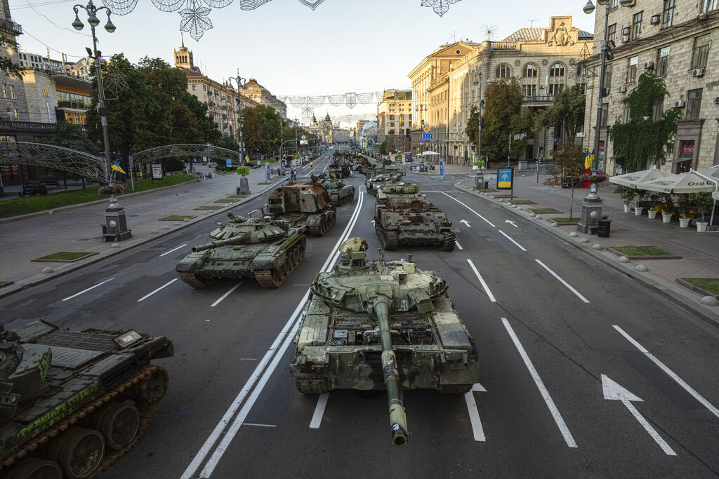 A view of destroyed Russian military vehicles installed in downtown Kyiv, Ukraine, Wednesday, Aug. 24, 2022. Kyiv authorities have banned mass gatherings in the capital through Thursday for fear of Russian missile attacks. Independence Day, like the six-month mark in the war, falls on Wednesday. (AP Photo/Evgeniy Maloletka)