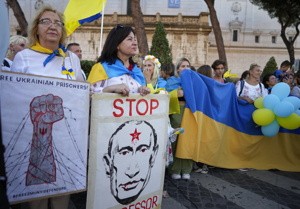 Members of the Ukrainian community in Rome participate in a 'march for freedom', Wednesday, Aug. 24, 2022, on Ukraine Independence Day. The march coincides with the six-month milestone of Russia's invasion of Ukraine. (AP Photo/Andrew Medichini)