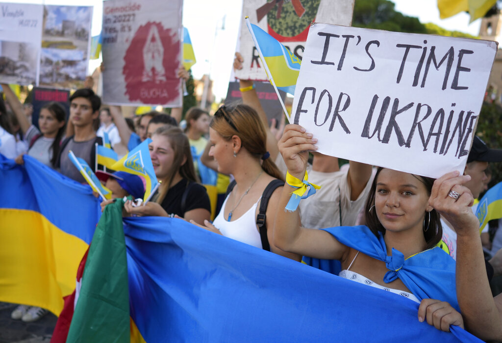 Members of the Ukrainian community in Rome participate in a 'march for freedom', Wednesday, Aug. 24, 2022, on Ukraine Independence Day. The march coincides with the six-month milestone of Russia's invasion of Ukraine. (AP Photo/Andrew Medichini)