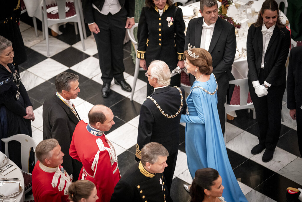 King Carl Gustav XVI and Queen Silvia of Sweden are seen at the gala banquet at Christiansborg Palace in Copenhagen, Sunday Sept 11, 2022. The banquet is held to mark the 50th anniversary of Danish Queen Margrethe II's accession to the throne (Mads Claus Rasmussen/Ritzau Scanpix via AP)