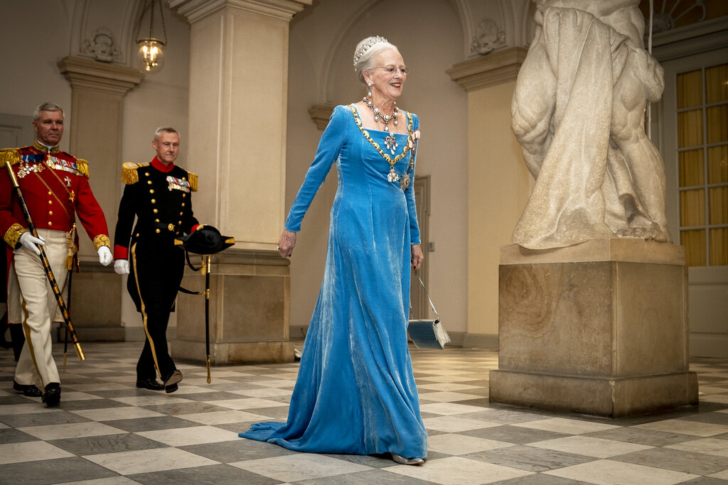 Danish Queen Margrethe arrives at the gala banquet at Christiansborg Palacein Copenhagen Sunday, Sept. 11, 2022. Scaled-down celebrations took place Sunday in Denmark marking 50 years on the throne by Queen Margrethe, whose reign is now Europe’s longest following the death of Britain’s Queen Elizabeth II.  (Mads Claus Rasmussen/Ritzau Scanpix via AP)