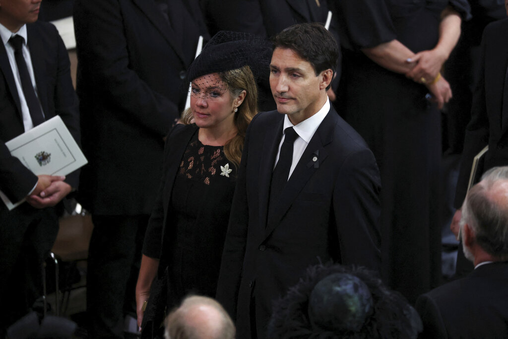 Canada's Prime Minister Justin Trudeau and his wife Sophie attend the funeral of Queen Elizabeth II, at the Westminster Abbey, in London Monday, Sept. 19, 2022. (Phil Noble/Pool Photo via AP)