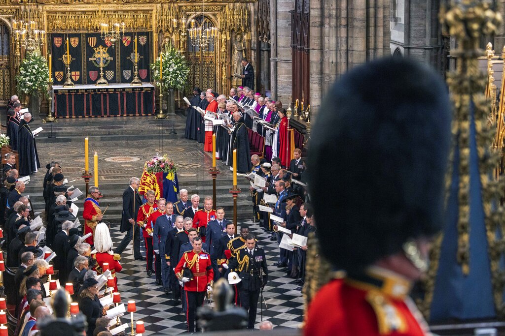 A view of the State Funeral of Queen Elizabeth II, at Westminster Abbey, in London, Monday Sept. 19, 2022. The Queen, who died aged 96 on Sept. 8, will be buried at Windsor alongside her late husband, Prince Philip, who died last year. (Jack Hill/Pool Photo via AP)