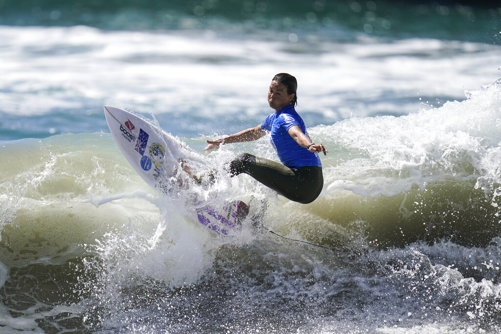 Sally Fitzgibbons, of Australia, competes during the ISA World Surfing Games in Huntington Beach, Calif., Tuesday, Sept. 20, 2022. (AP Photo/Jae C. Hong)