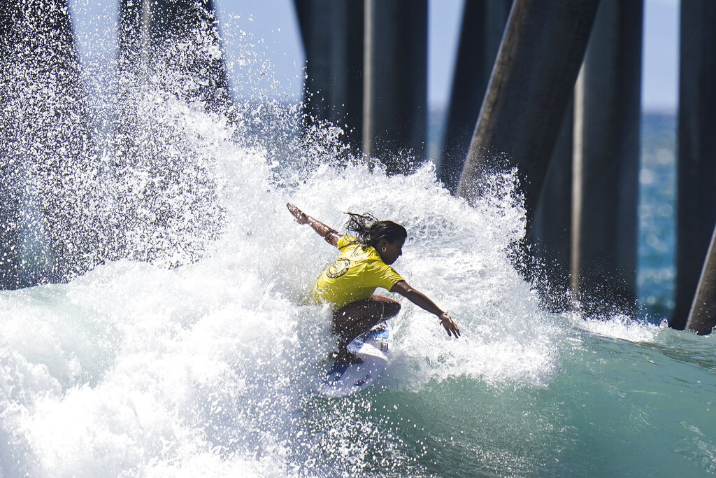 Mahina Maeda, of Japan, competes during the ISA World Surfing Games in Huntington Beach, Calif., Tuesday, Sept. 20, 2022. (AP Photo/Jae C. Hong)