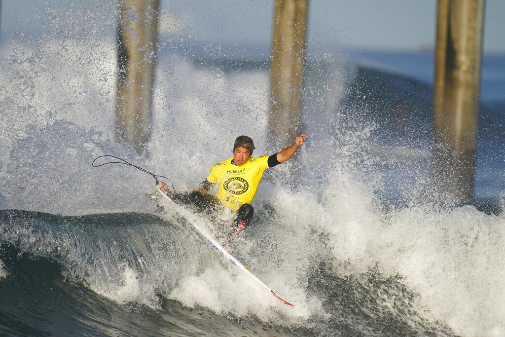 Kanoa Igarashi, of Japan, competes during the ISA World Surfing Games in Huntington Beach, Calif., Tuesday, Sept. 20, 2022. (AP Photo/Jae C. Hong)