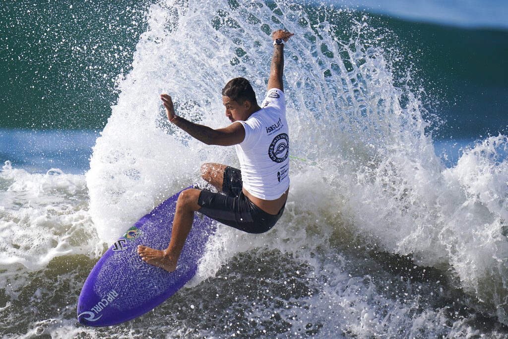 Samuel Pupo, of Brazil, competes during the ISA World Surfing Games in Huntington Beach, Calif., Tuesday, Sept. 20, 2022. (AP Photo/Jae C. Hong)