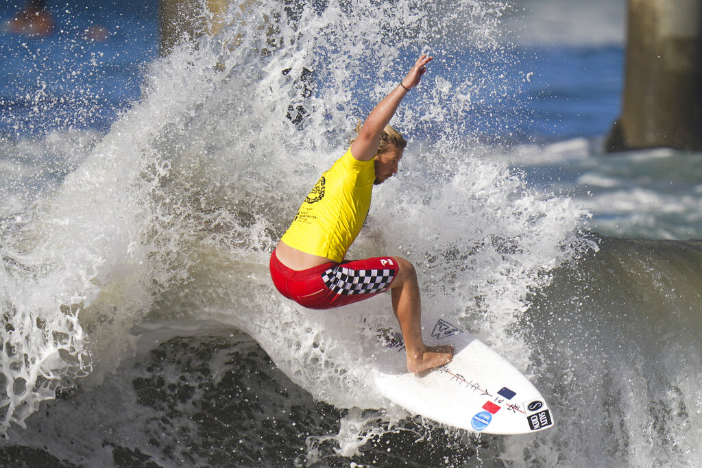 Tim Bisso, of France, competes during the ISA World Surfing Games in Huntington Beach, Calif., Tuesday, Sept. 20, 2022. (AP Photo/Jae C. Hong)