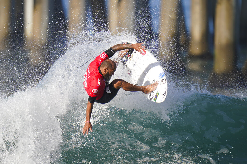 Jadson Andre, of Brazil, competes during the ISA World Surfing Games in Huntington Beach, Calif., Tuesday, Sept. 20, 2022. (AP Photo/Jae C. Hong)