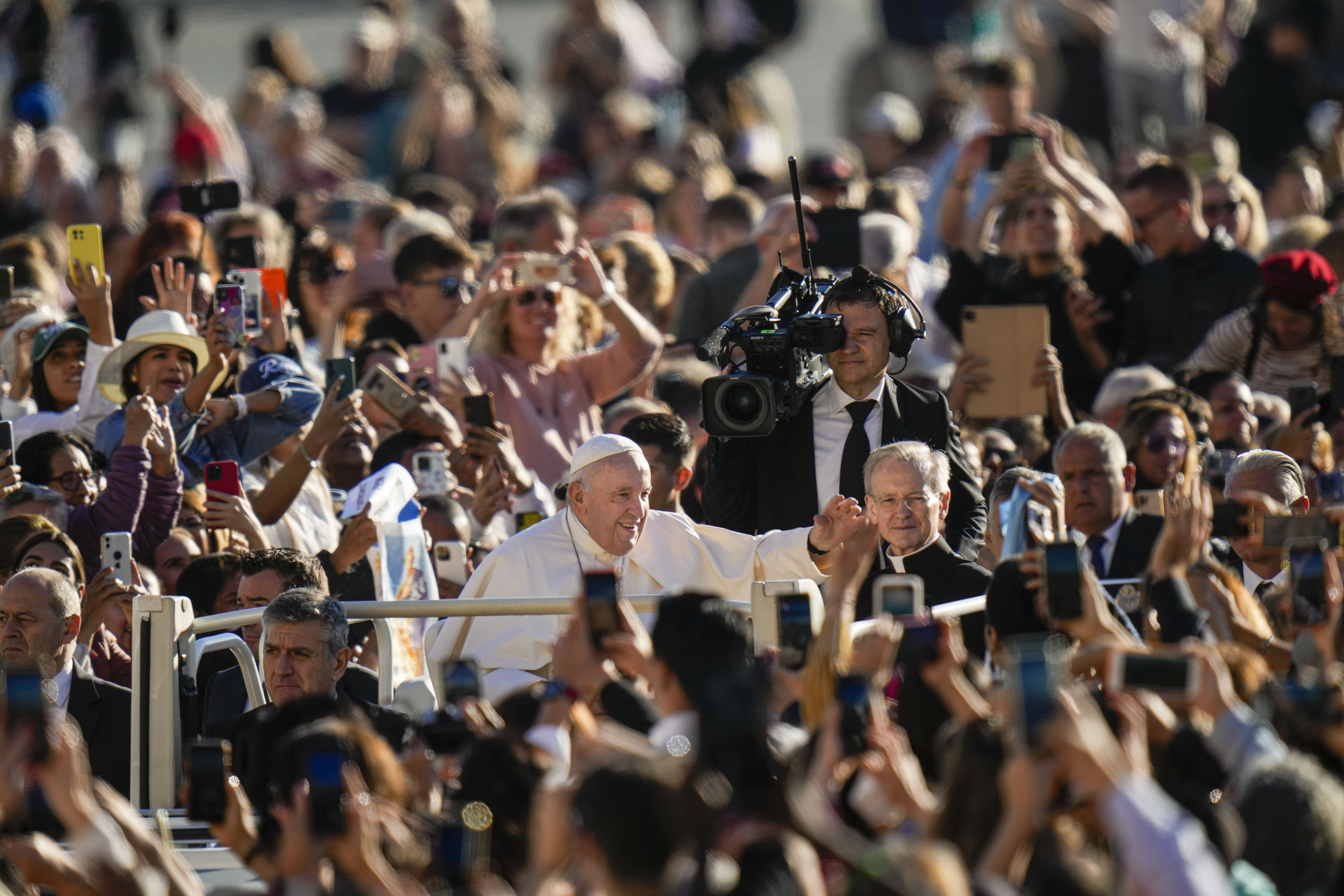 Pope Francis arrives for his weekly general audience in St. Pater's Square at The Vatican, Wednesday, Oct. 5, 2022. (AP Photo/Alessandra Tarantino)