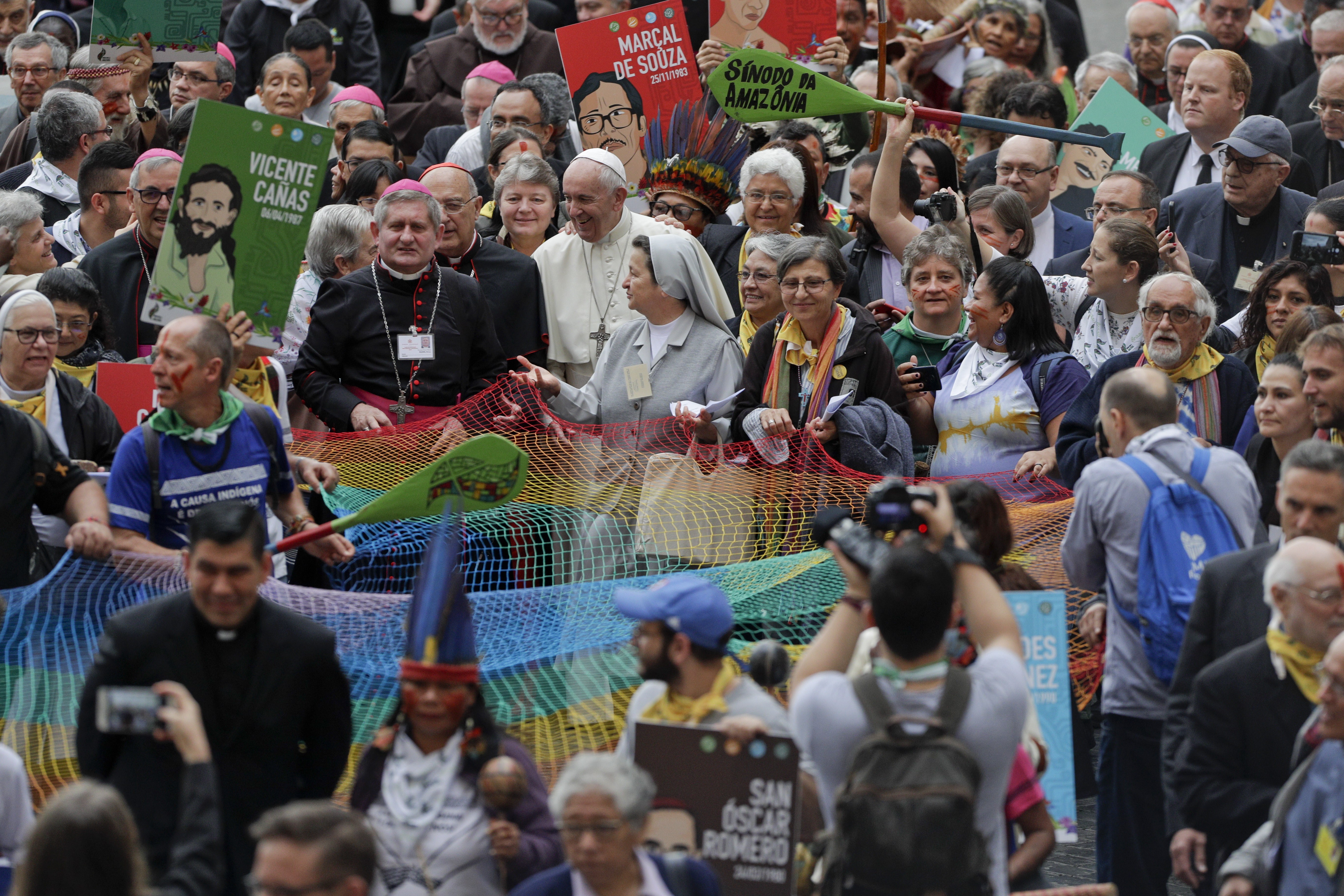 Pope Francis walks in procession on the occasion of the Amazon synod, at the Vatican, Monday, Oct. 7, 2019. Pope Francis opened a three-week meeting on preserving the rainforest and ministering to its native people as he fended off attacks from conservatives who are opposed to his ecological agenda. (AP Photo/Andrew Medichini)