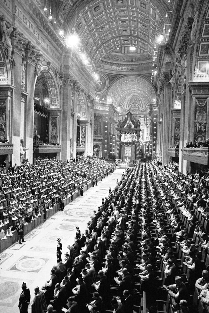 Council fathers fill all available space along the main nave of St. Peter's Basilica in Vatican City, Dec. 3, 1963 for Roman Catholic commemoration of the anniversary of the Council of Trent. During the ceremony a personal Papal Decree was issued extending the powers of bishops. (AP Photo)