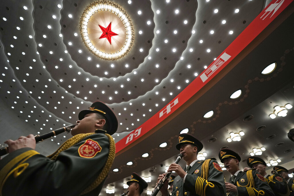 The military band rehearses at the Great Hall of the People before the opening ceremony for the 20th National Congress of China's ruling Communist Party in Beijing, China, Sunday, Oct. 16, 2022. China on Sunday opens a twice-a-decade party conference at which leader Xi Jinping is expected to receive a third five-year term that breaks with recent precedent and establishes himself as arguably the most powerful Chinese politician since Mao Zedong. (AP Photo/Mark Schiefelbein)