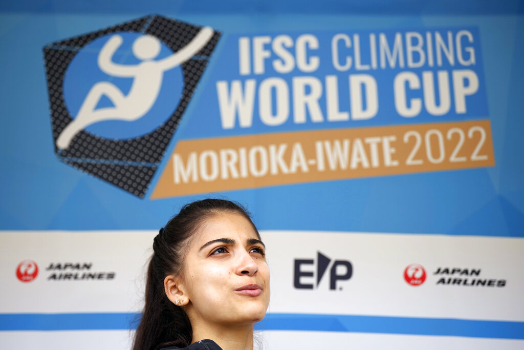 Natalia Grossman of the U.S. speaks after participating in the women's lead semifinal of the IFSC Climbing World Cup Friday, Oct. 21, 2022, in Morioka, Iwate Prefecture, Japan. After Iranian climber Elnaz Rekabi joined a growing list of female athletes who have been targeted by their governments for defying authoritarian policies or acting out against bullying, a number of others have spoken out on their concerns of politics crossing into their sporting world. (AP Photo/Eugene Hoshiko)