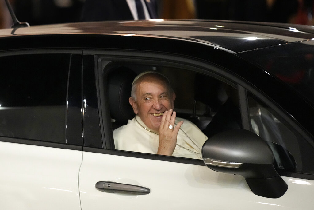 Pope Francis smiles and waves from a Fiat 500, as he leaves Sakhir Royal Palace after he met with Bahrain's King Hamad bin Isa Al Khalifa, in Sakhir, Bahrain, Thursday, Nov. 3, 2022. Pope Francis is making the November 3-6 visit to participate in a government-sponsored conference on East-West dialogue and to minister to Bahrain's tiny Catholic community, part of his effort to pursue dialogue with the Muslim world. (AP Photo/Hussein Malla)