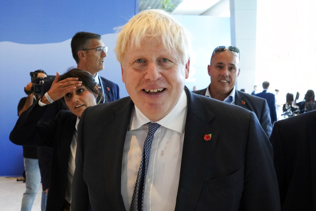 Former British Prime Minister Boris Johnson attends the COP27 U.N. Climate Summit, Monday, Nov. 7, 2022, in Sharm el-Sheikh, Egypt. (AP Photo/Peter Dejong)
