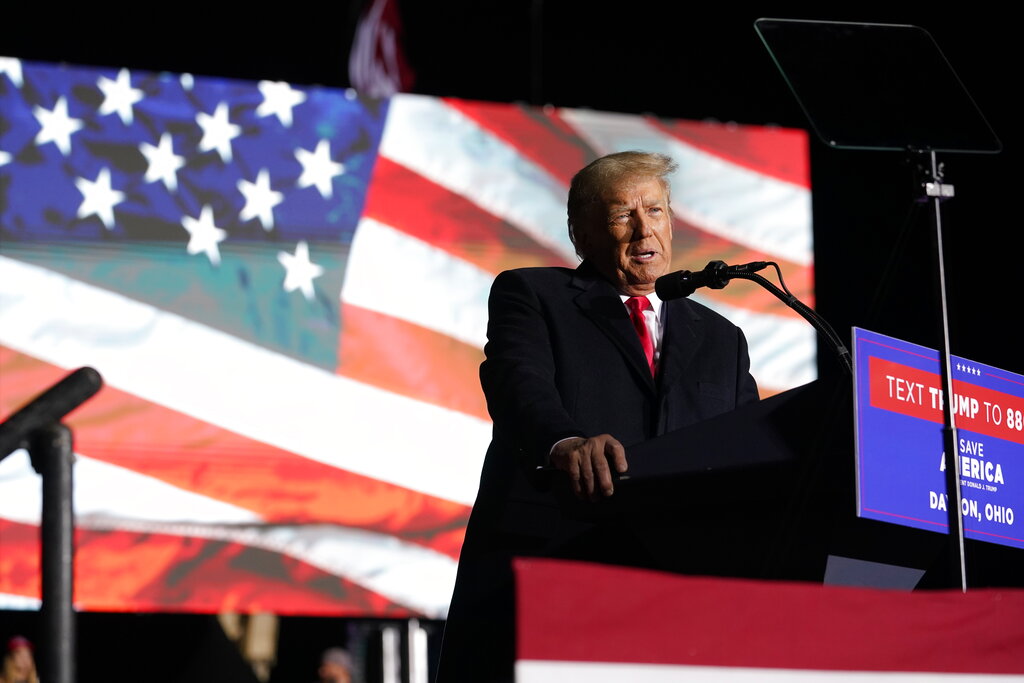 Former President Donald Trump speaks at a campaign rally in support of the campaign of Ohio Senate candidate JD Vance at Wright Bros. Aero Inc. at Dayton International Airport on Monday, Nov. 7, 2022, in Vandalia, Ohio. (AP Photo/Michael Conroy)