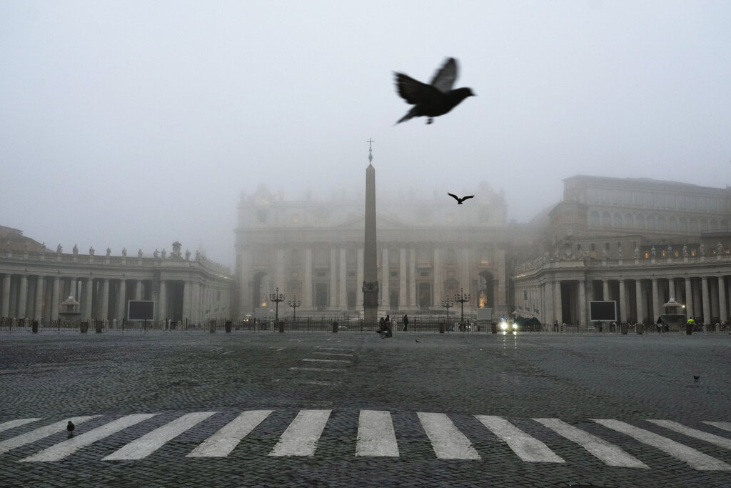 A thick fog shrouds St. Peter's Basilica Dome, at the Vatican, Thursday, Nov. 17, 2022. (AP Photo/Gregorio Borgia)