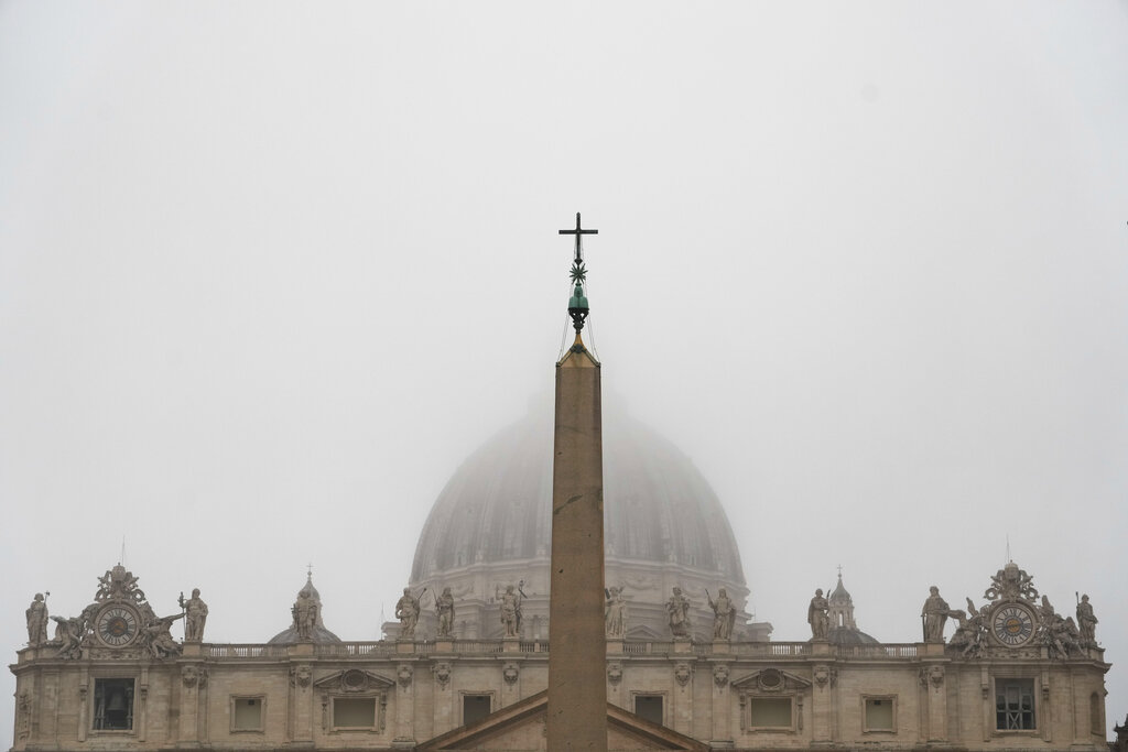 A thick fog shrouds St. Peter's Basilica Dome, at the Vatican, Thursday, Nov. 17, 2022. (AP Photo/Gregorio Borgia)