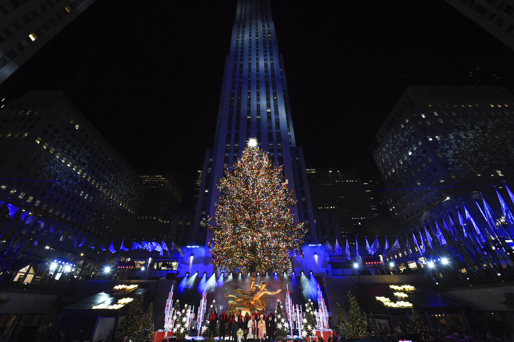 IMAGE DISTRIBUTED FOR TISHMAN SPEYER - The Rockefeller Center Christmas Tree stands lit during the Rockefeller Center Christmas tree lighting ceremony on Wednesday, Nov. 30, 2022 in New York. The 82-foot tall, 14-ton Norway Spruce is covered with more than 50,000 multi-colored, energy-efficient LED lights. The lit tree will be on display through mid-January 2023. (Diane Bondareff/AP Images for Tishman Speyer)