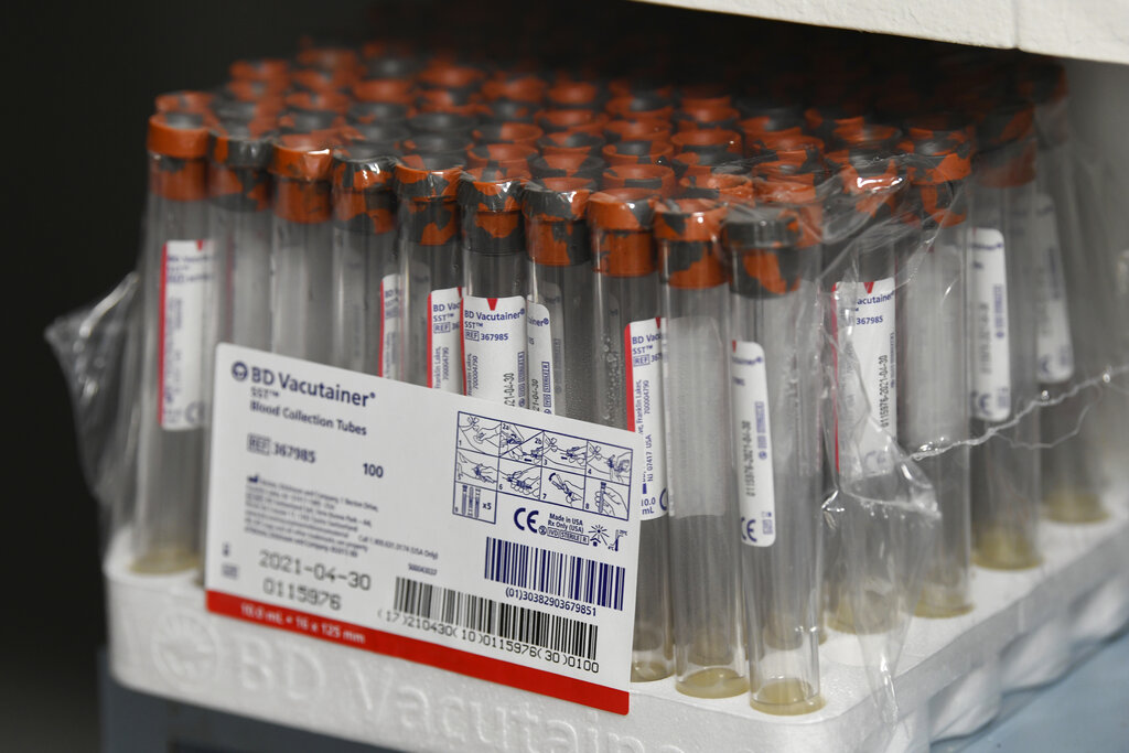 Empty collection vials are stored for the NIH funded Moderna COVID-19 vaccine third phase clinical trail wait to be processed in the specimen processing lab￼ at the University of Miami Miller School of Medicine in Miami, Fla., Wednesday, Sept. 2, 2020 in Miami. (AP Photo/Taimy Alvarez)