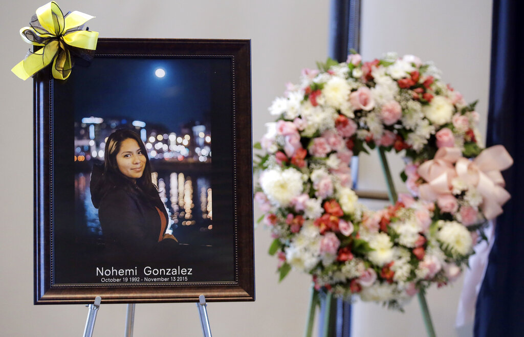 FILE - A picture is displayed during a memorial service for California State Long Beach student Nohemi Gonzalez, who was killed by Islamic State gunmen in Paris, Sunday, Nov. 15, 2015, in Long Beach, Calif. A lawsuit against YouTube from the family of Nohemi Gonzalez is at the center of a  closely watched Supreme Court case being argued Tuesday, Feb. 21, 2023. (AP Photo/Chris Carlson, File)