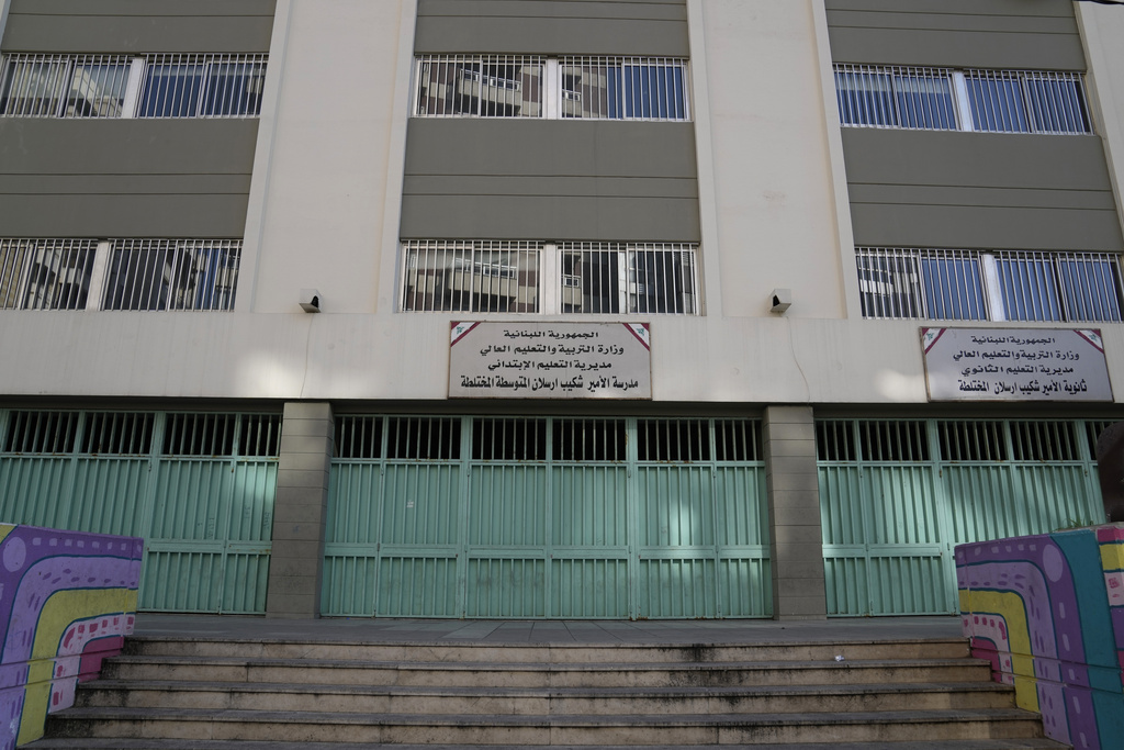 One of the biggest public school is seen closed n Beirut, Lebanon, Wednesday, March 1, 2023. Public schools have been open for fewer than 50 days this school year because teachers are on strike, protesting dramatic currency devaluations that slashed their salaries to about $20 a month. (AP Photo/Hussein Malla)