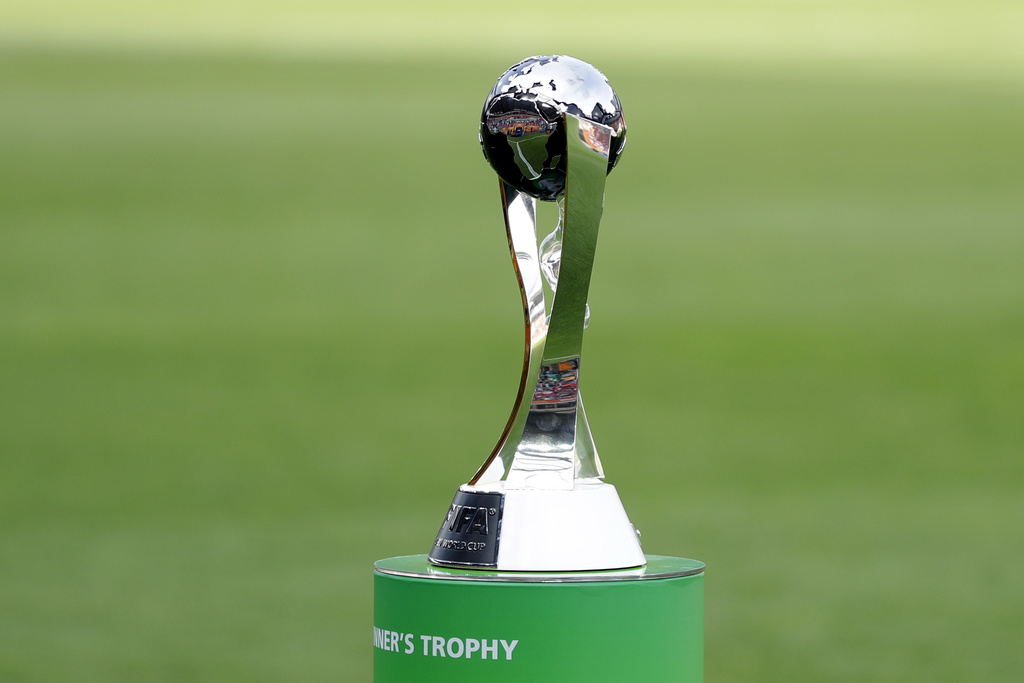 FILE  - A view of the trophy displayed on the pitch prior to the final match between Ukraine and South Korea at the U20 World Cup soccer, in Lodz, Poland, Saturday, June 15, 2019.  Indonesia has been stripped of hosting the men's Under-20 World Cup amid political turmoil regarding Israel’s participation. FIFA says Indonesia is not ready to stage the 24-team tournament scheduled to start on May 20, 2023. The decision comes after a meeting in Doha between FIFA president Gianni Infantino and Indonesian soccer federation president Erick Thohir. (AP Photo/Sergei Grits, File)