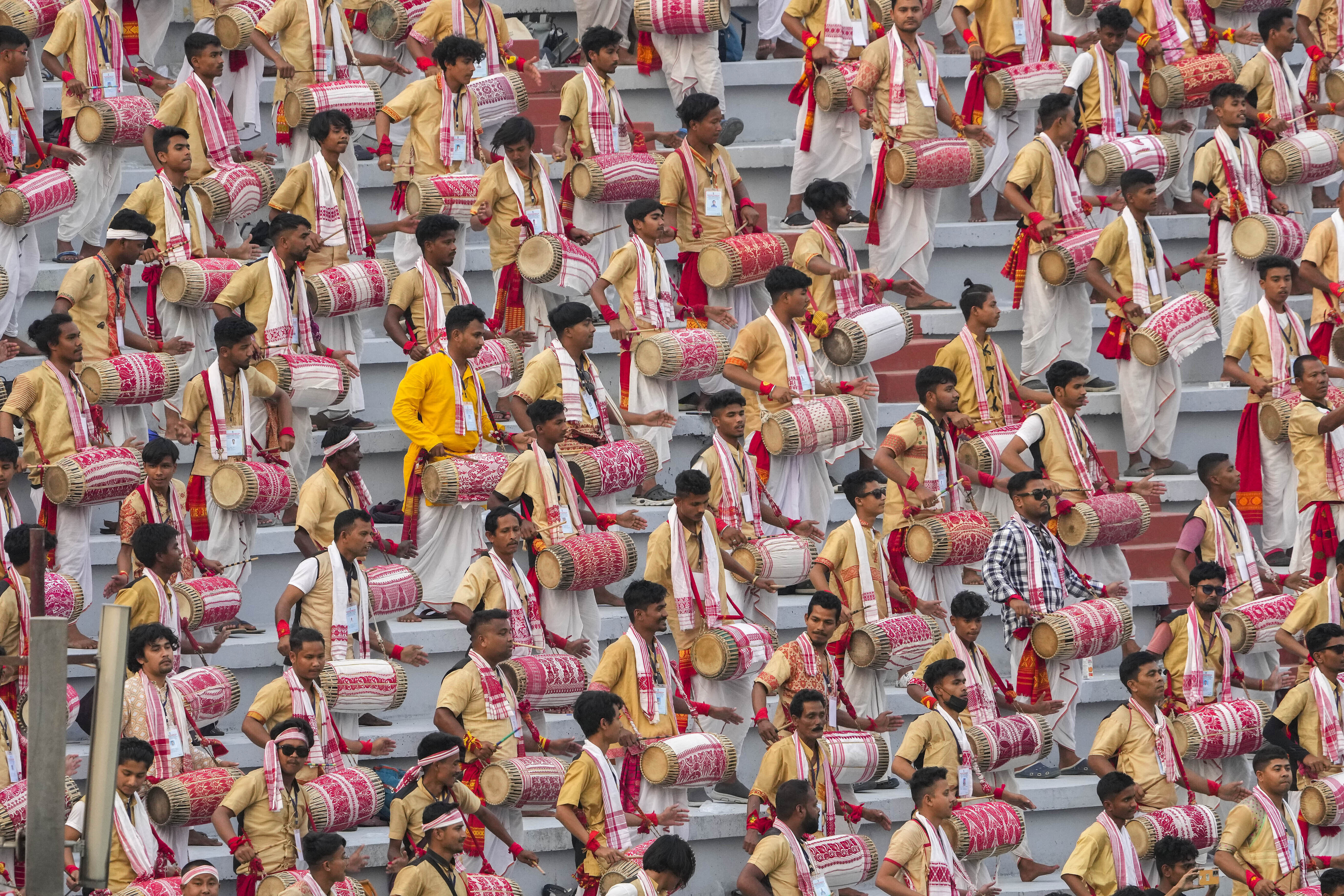 Assamese musicians in traditional attire practice playing Dhols or drums ahead of an event in Guwahati, India, Tuesday, April 11, 2023. Around 11,000 Bihu dancers and musicians will perform together for Guinness World Record in the largest folk dance performance category on April 14. (AP Photo/Anupam Nath)

Associated Press/LaPresse
Only Italy and Spain