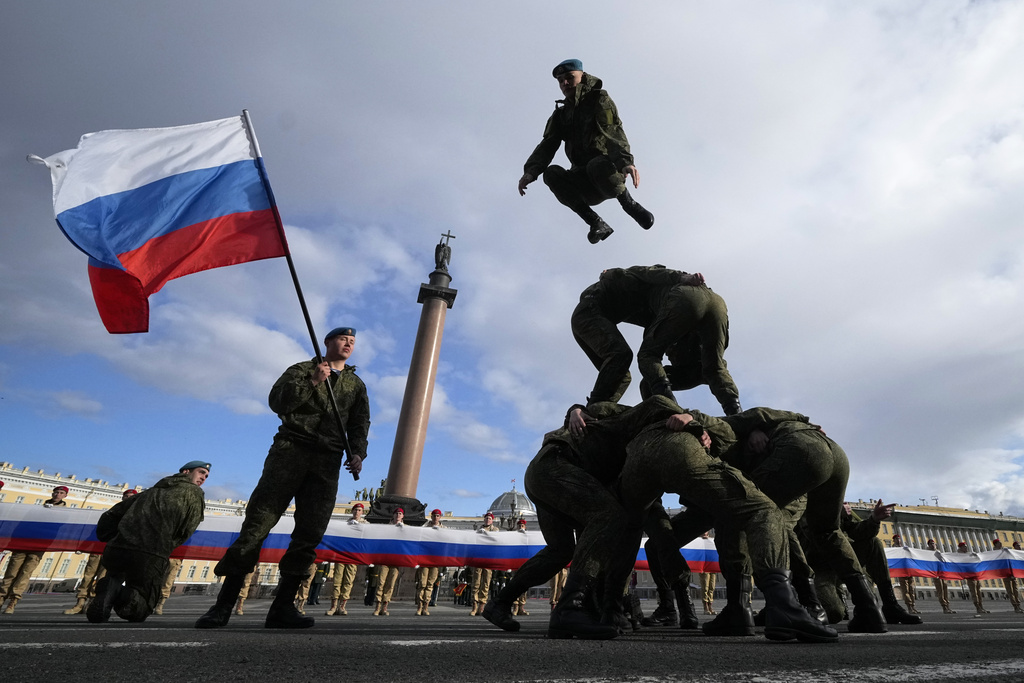 Servicemen demonstrate their skills during a rehearsal for the Victory Day military parade which will take place at Dvortsovaya (Palace) Square on May 9 to celebrate 78 years after the victory in World War II in St. Petersburg, Russia, Thursday, May 4, 2023. (AP Photo/Dmitri Lovetsky)