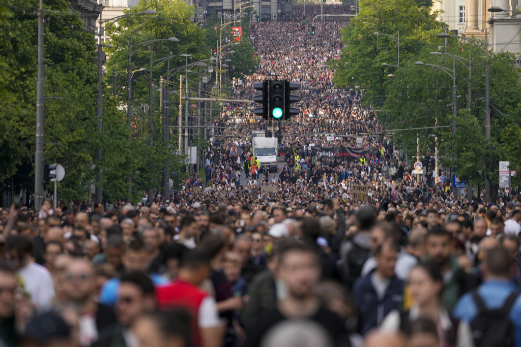 People march during a protest against violence in Belgrade, Serbia, Friday, May 19, 2023. Tens of thousands of people rallied in Serbia's capital on Friday for a third time in a month in protest at the government's handling of a crisis after two mass shootings in the Balkan country earlier this month, even as officials rejected the criticism and ignored their demands. (AP Photo/Darko Vojinovic)