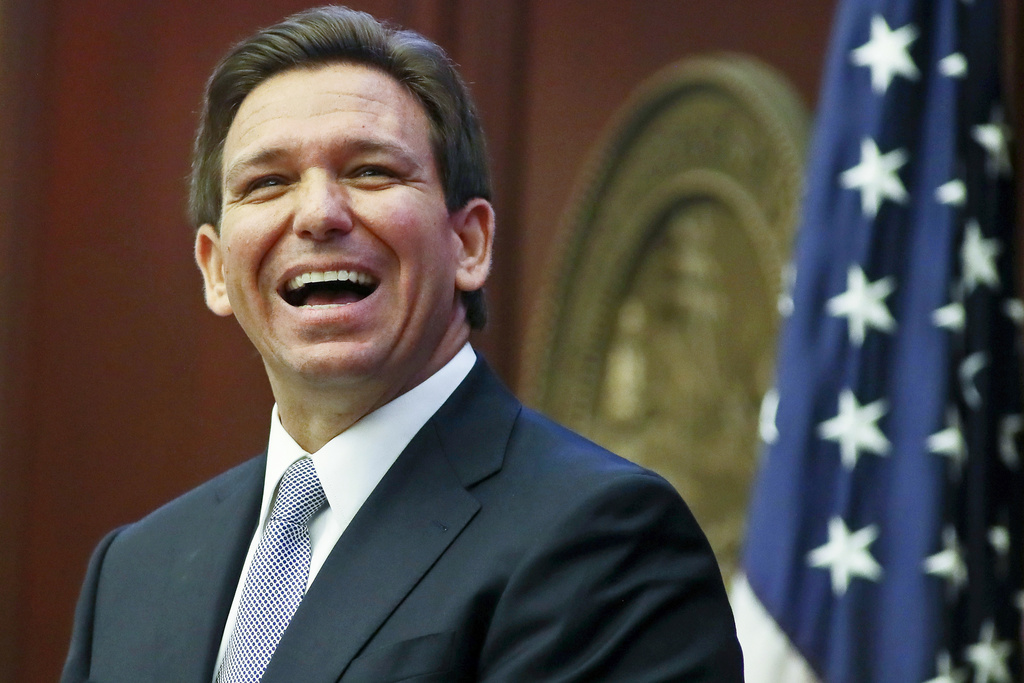FILE - Florida Gov. Ron DeSantis reacts to applause as he gives his State of the State address during a joint session of the Senate and House of Representatives March 7, 2023, at the Capitol in Tallahassee, Fla. (AP Photo/Phil Sears, File)