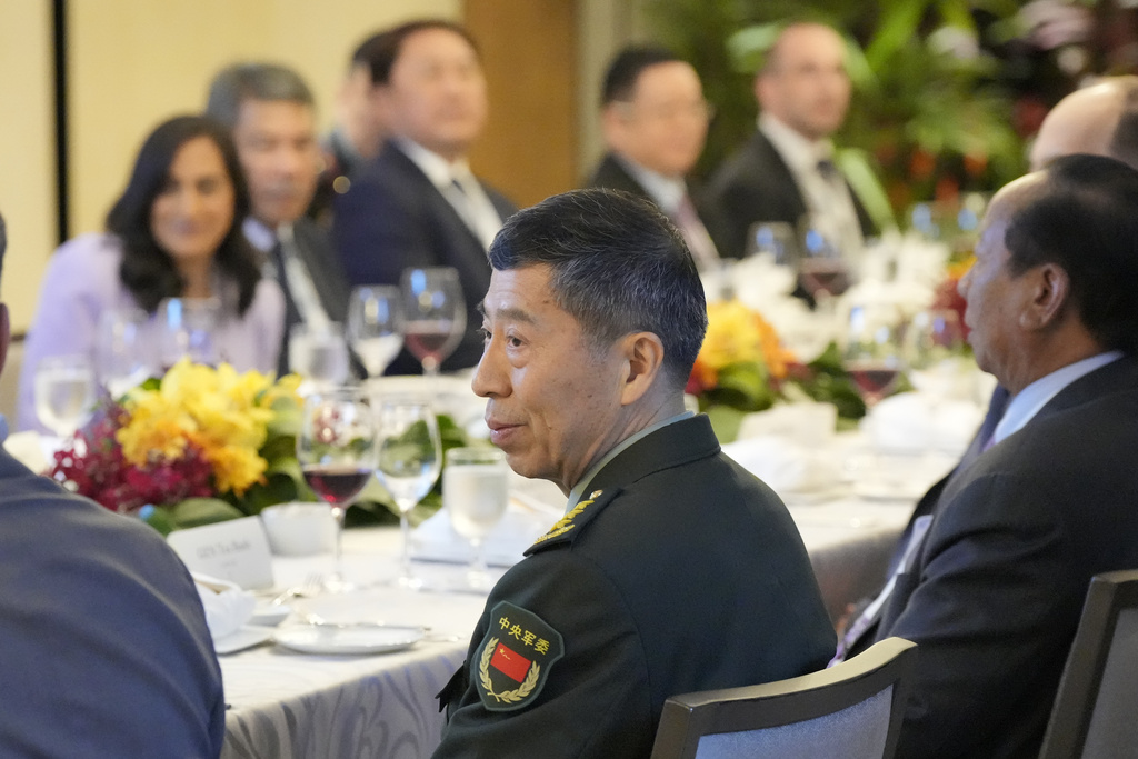 China's Defense Minister Li Shangfu, attends the ministerial roundtable session during the 20th International Institute for Strategic Studies (IISS) Shangri-La Dialogue, Asia's annual defense and security forum in Singapore, Saturday, June 3, 2023. (AP Photo/Vincent Thian)