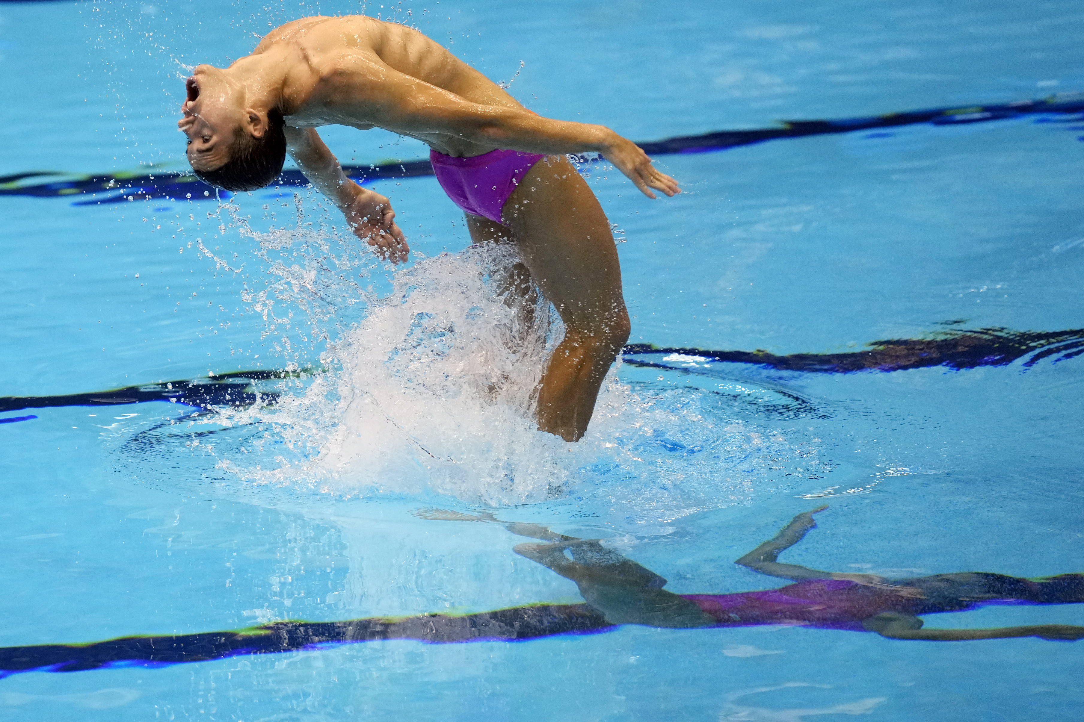 Andy Manuel Avila Gonzalez and Carelys Valdes Castillo of Cuba compete during the mixed duet free preliminary of the artistic swimming at the World Swimming Championships in Fukuoka, Japan,Friday, July 21, 2023. (AP Photo/Eugene Hoshiko)