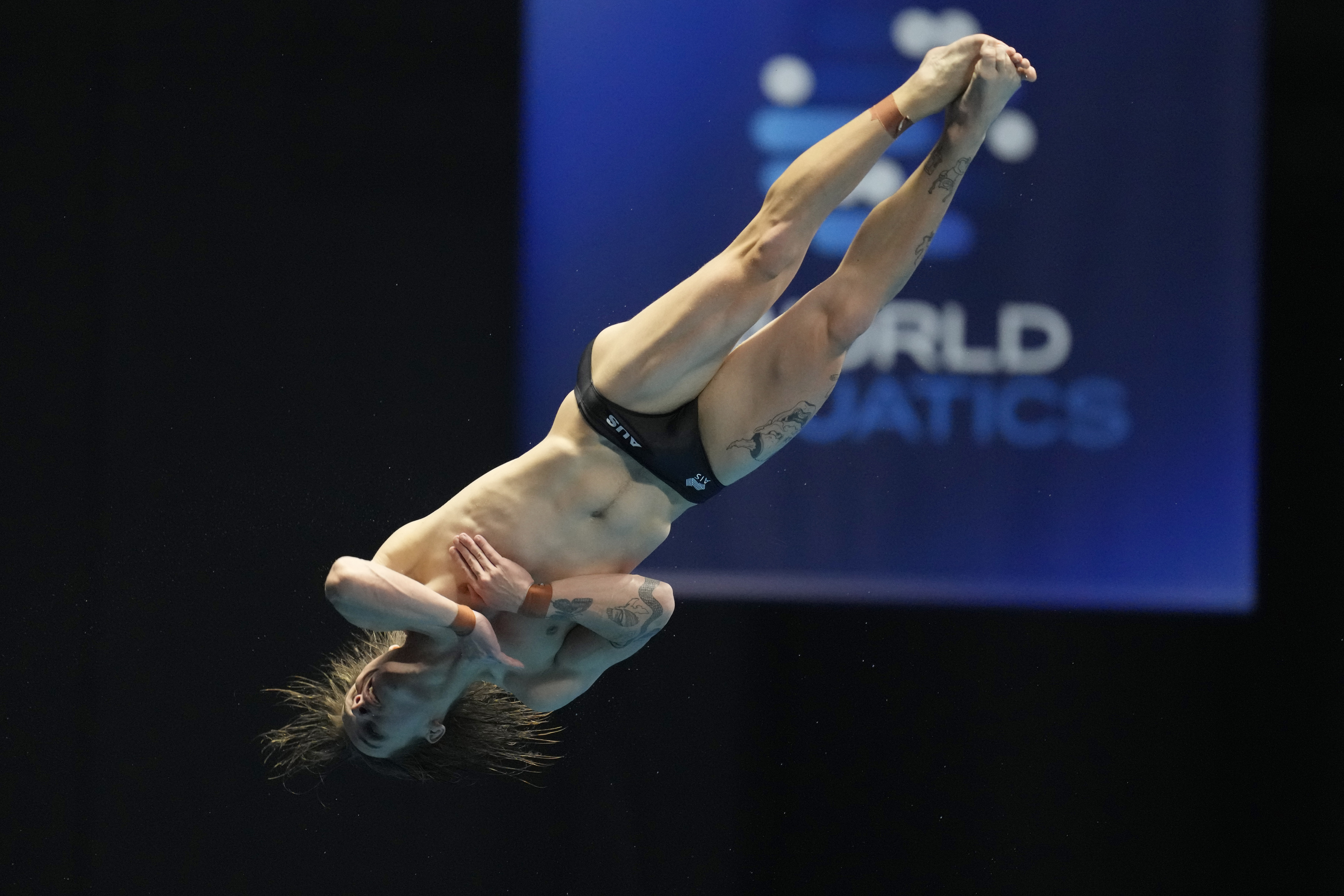 Cassiel Rousseau of Australia competes during the men's 10m platform diving preliminary at the World Swimming Championships in Fukuoka, Japan, Friday, July 21, 2023. (AP Photo/Lee Jin-man)