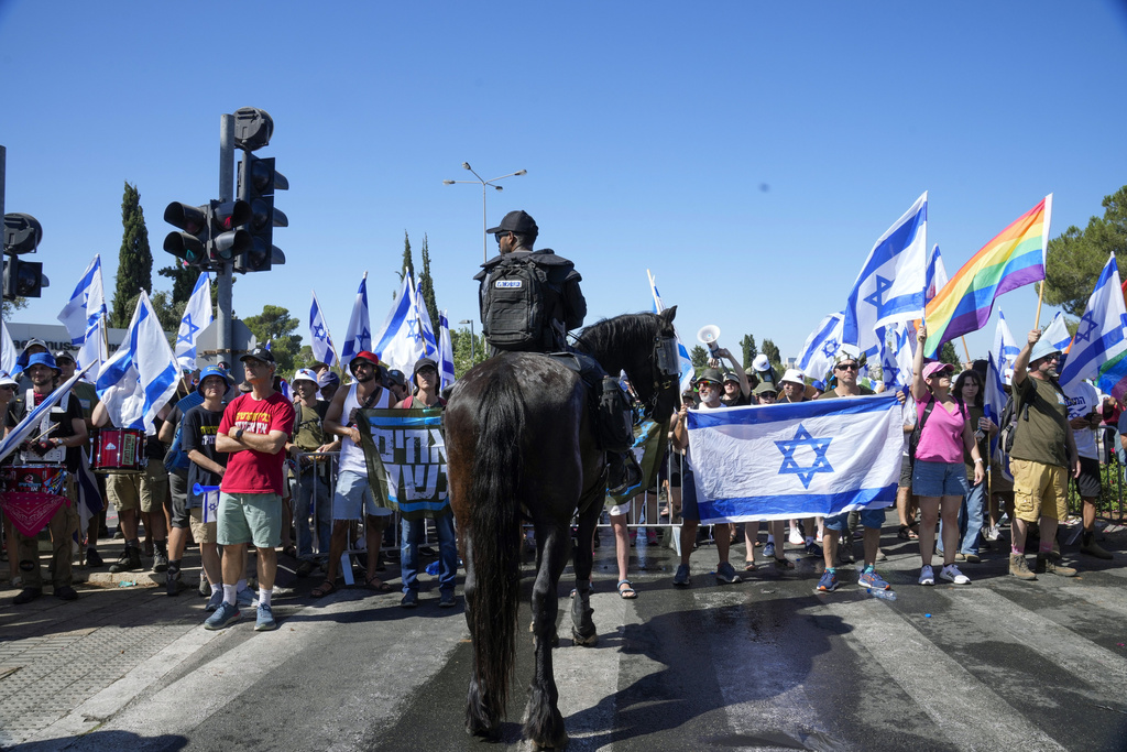 Israelis protest against Prime Minister Benjamin Netanyahu's judicial overhaul plan outside the parliament in Jerusalem, Monday, July 24, 2023. (AP Photo/Maya Alleruzzo)