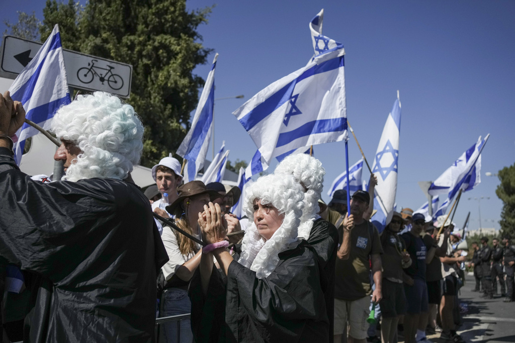 Israelis protest against Prime Minister Benjamin Netanyahu's judicial overhaul plan, outside the parliament in Jerusalem, Monday, July 24, 2023. (AP Photo/Maya Alleruzzo)