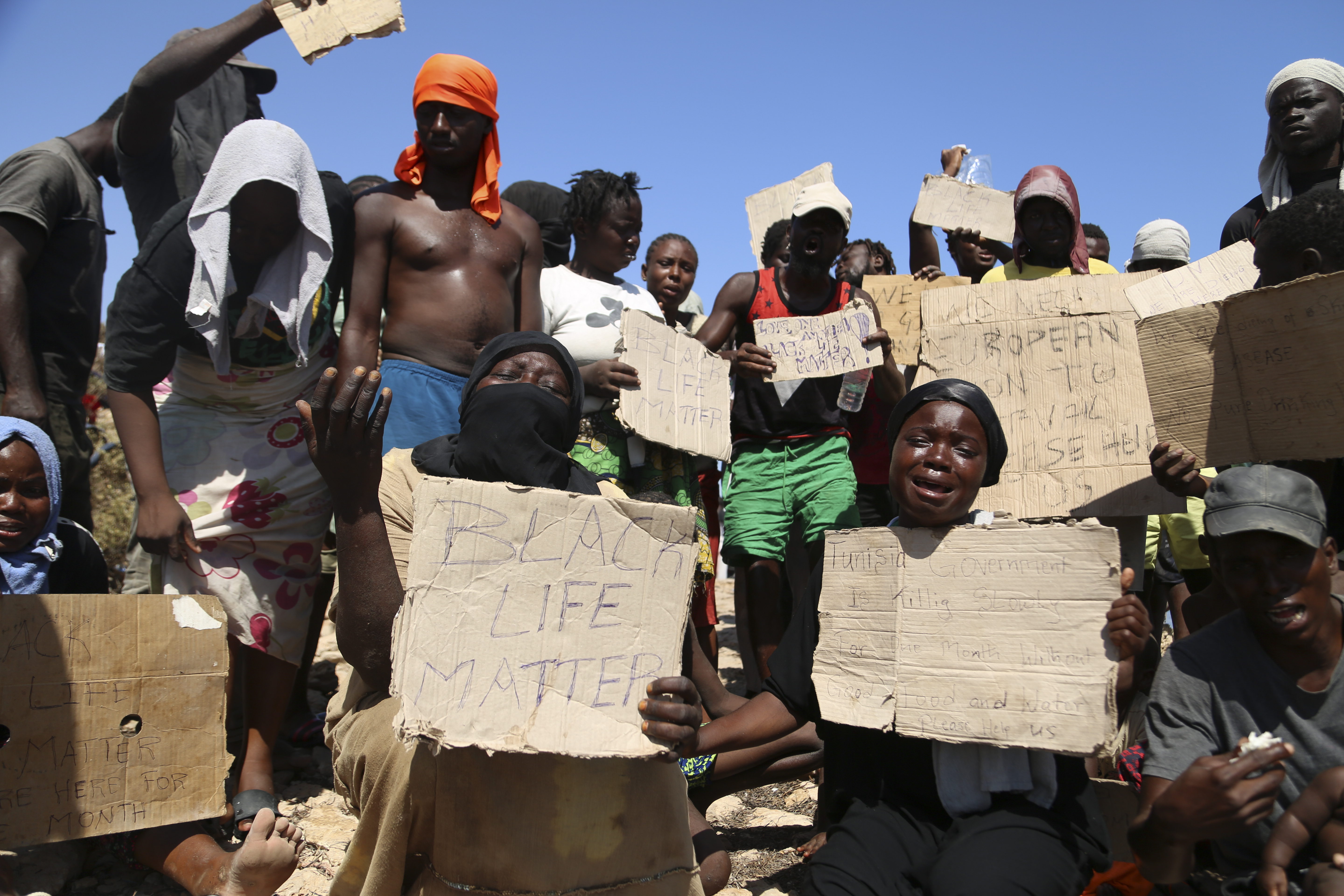 African migrants protest on the Libyan border with Tunisia on Thursday, Aug. 4, 2023. The Tunisian security forces reportedly expelled hundreds of migrants over the border into Libya, where they have been stranded in scorching summer temperatures without water and food since June. (AP Photo/Yousef Murad)


Associated Press/LaPresse
Only Italy and Spain