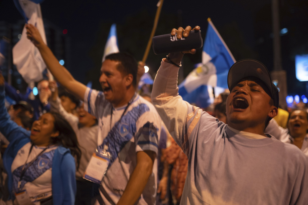 Supporters of presidential candidate Bernardo Arevalo celebrate his expected victory in the runoff presidential election in Guatemala City, Sunday, Aug. 20, 2023. Guatemala´s Supreme Electoral Tribunal Magistrate Blanca Alfaro called Arevalo the 
