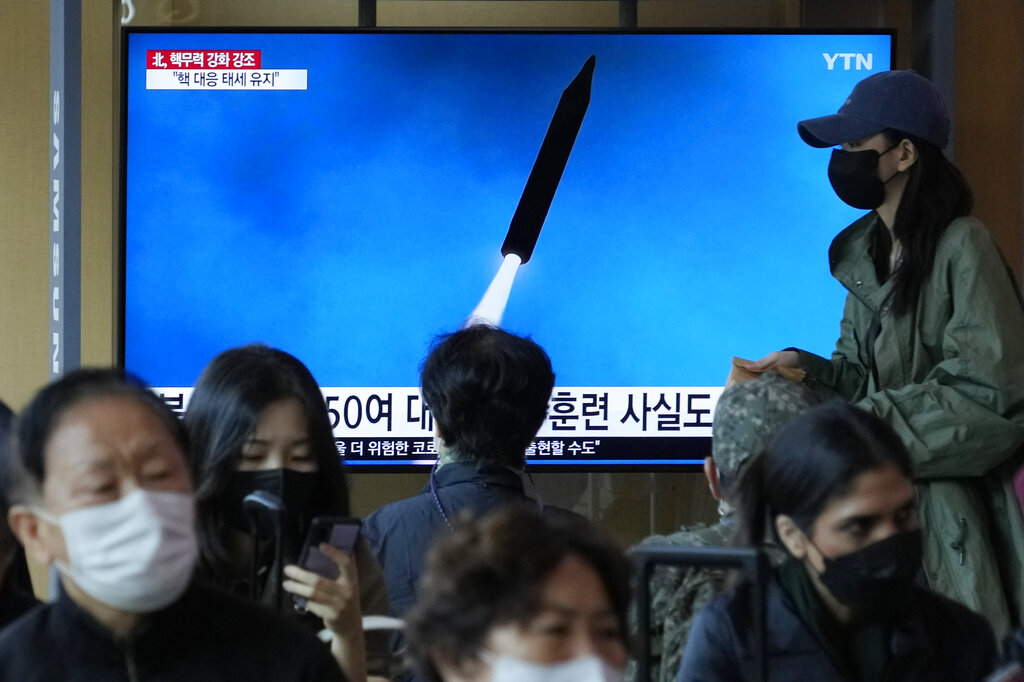A TV screen shows an image of North Korea's missile launch during a news program at the Seoul Railway Station in Seoul, South Korea, Monday, Oct. 10, 2022. North Korea said Monday its recent barrage of missile launches were tests of its tactical nuclear weapons to “hit and wipe out” potential South Korean and U.S. targets, state media reported Monday. Leader Kim Jong Un signaled he would conduct more provocative tests in coming weeks. (AP Photo/Ahn Young-joon)