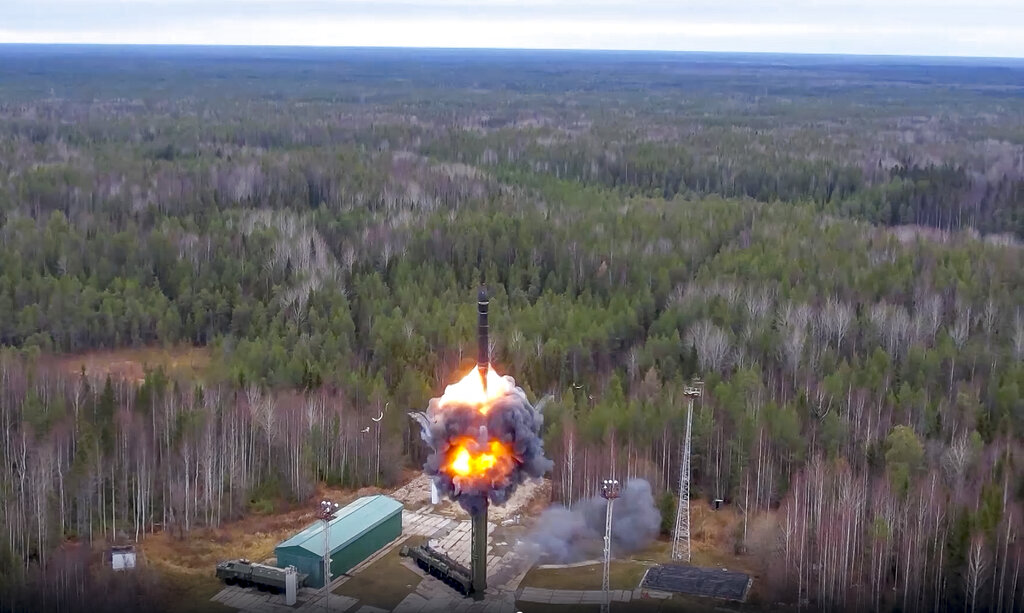 FILE - In this photo taken from video released by Russian Defense Ministry Press Service on Wednesday, Oct. 26, 2022, a Yars intercontinental ballistic missile is test-fired as part of Russia's nuclear drills from a launch site in Plesetsk, northwestern Russia. War has been a catastrophe for Ukraine and a crisis for the globe. One year on, thousands of civilians are dead, and countless buildings have been destroyed. Hundreds of thousands of troops have been killed or wounded on each side. (Russian Defense Ministry Press Service via AP, File)