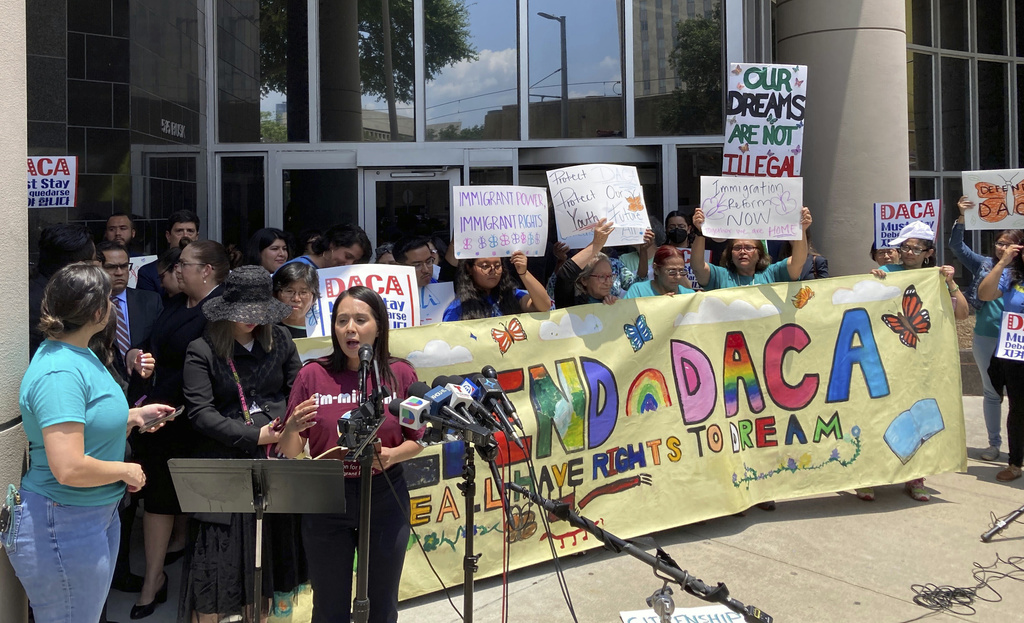 Maritza Gutierrez Ramos, 28, speaks at a rally outside the federal courthouse following a hearing on the fate of a revised version of the Deferred Action for Childhood Arrivals, or DACA, program, Thursday, June 1, 2023 in Houston. A federal judge did not make an immediate decision Thursday on the fate of a revised version of a federal policy that prevents the deportation of hundreds of thousands of immigrants brought to the U.S. as children. (AP Photo/Juan A. Lozano)