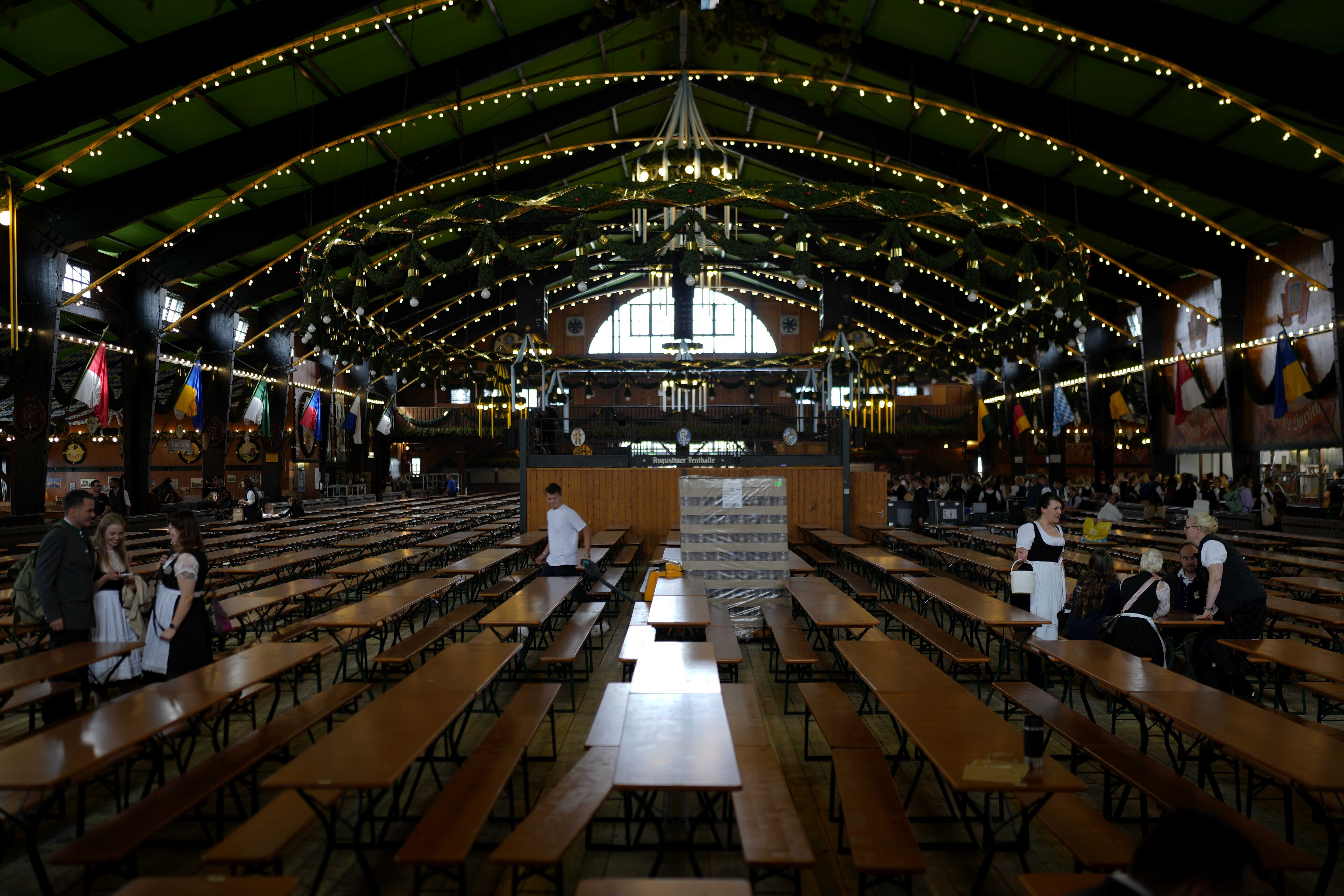 Employees gather in a beer tent during preparations for the 188th Oktoberfest beer festival in Munich, Germany, Thursday, Sept. 14, 2023. The world's largest beer festival will be held from Sept. 16 to Oct. 3, 2023. (AP Photo/Matthias Schrader)

Associated Press/LaPresse
Only Italy and Spain